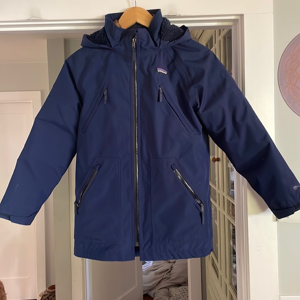 Patigonia kids large rain shell and down jacket.
